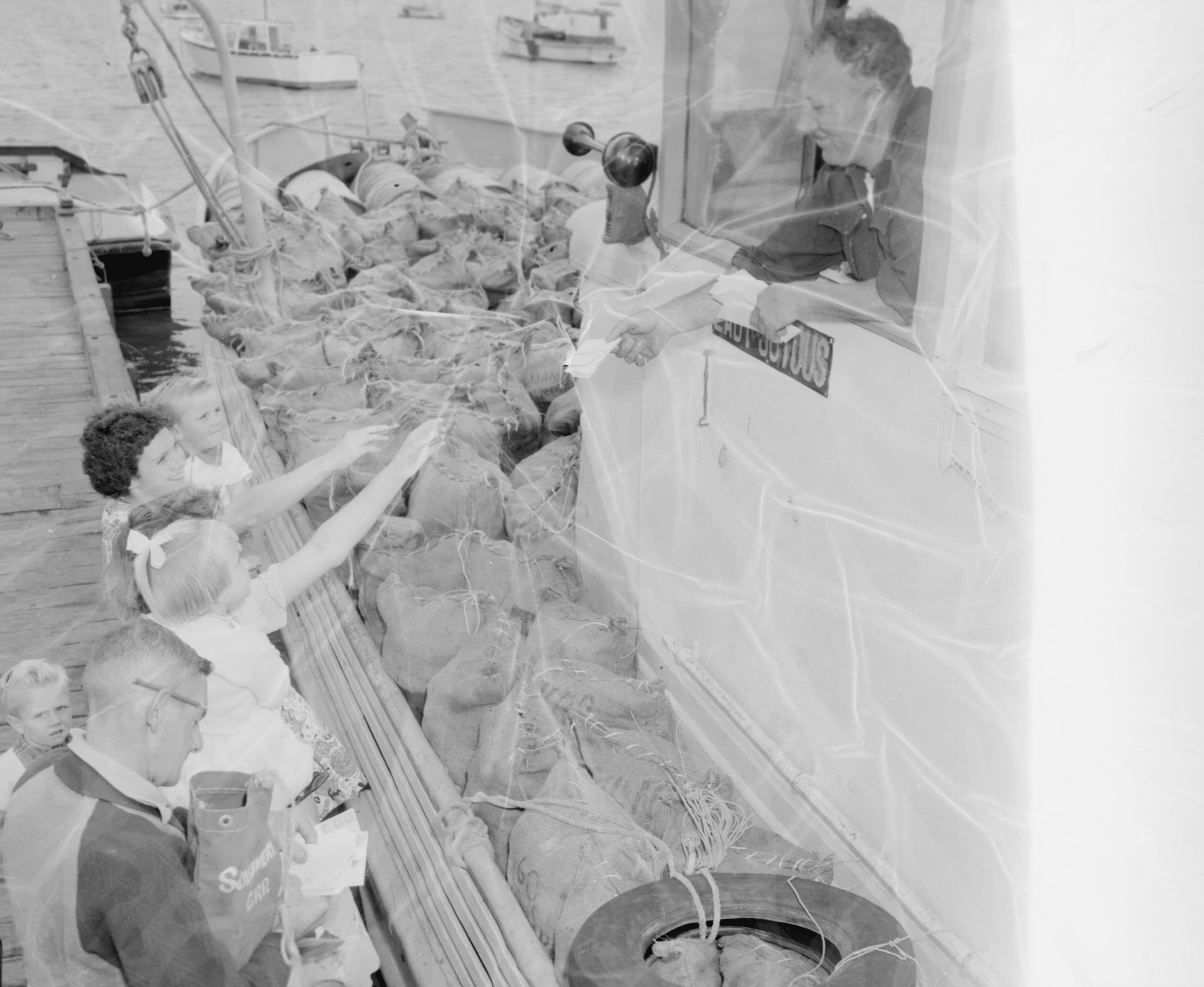 Tani Travia 16 April 1956 delivers mail