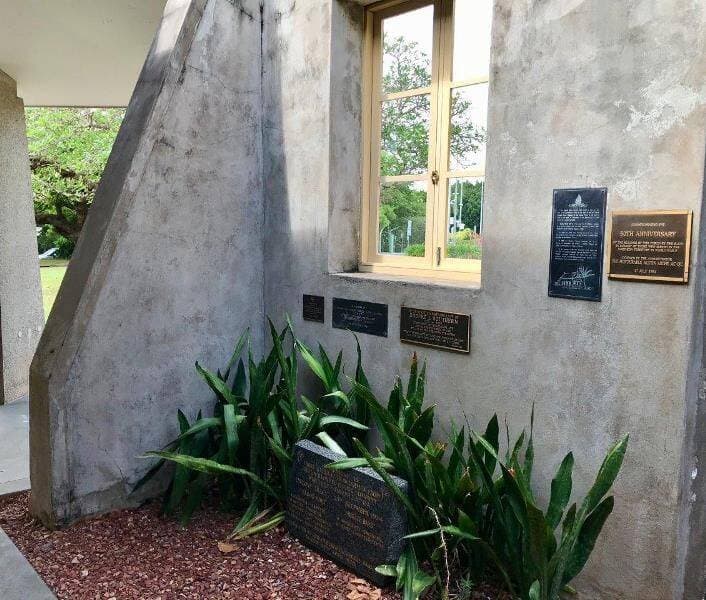 The plaque in Darwin's Cathedral grounds.